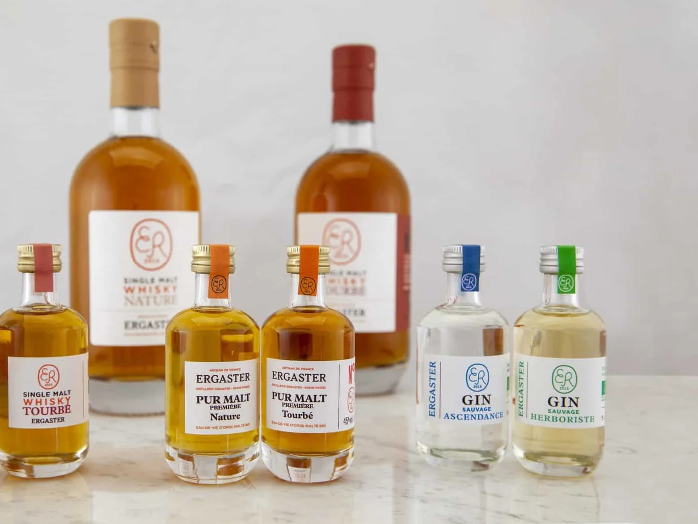 Gamme de whiskies et de gins de la Distillerie Ergaster
