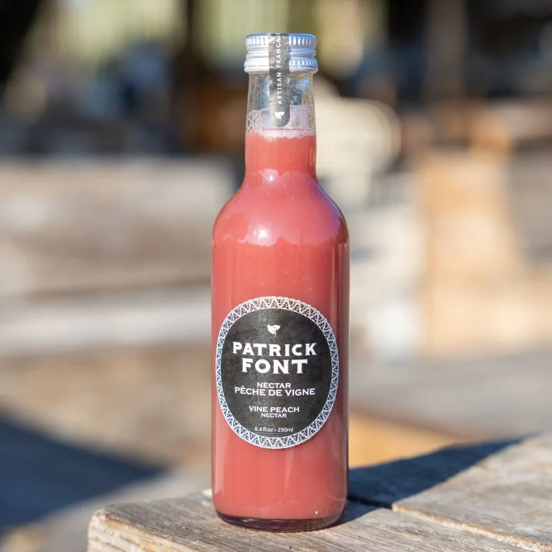 Bouteille de nectar de pêche de vigne Patrick Font