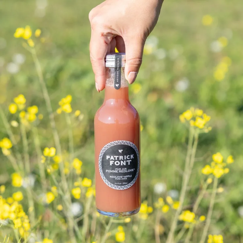 Bouteille de pur jus de pomme Redlove Patrick Font